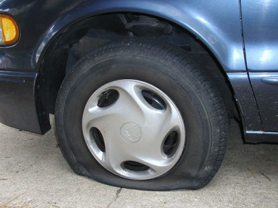 Car with a flat tire